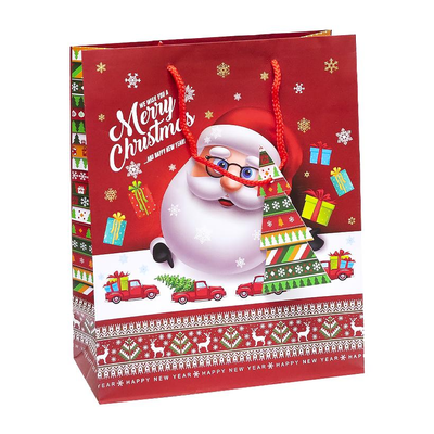 Подарочный пакет "Merry Christmas,Дід Мороз за столом" 26х32х12 см (1 штука) GB23137 фото