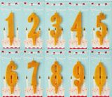 Свічки для торту набір Золото цифра 0-9 (100шт) 153 фото